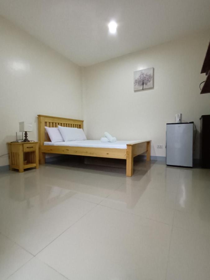 Grae'S Apartelle Moalboal Bagian luar foto