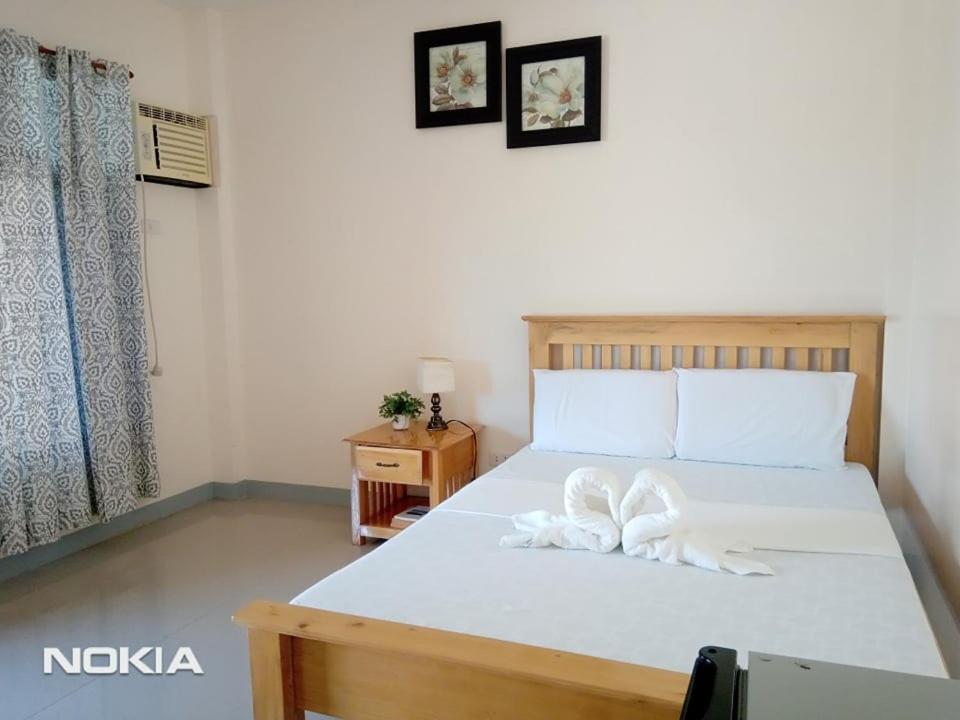 Grae'S Apartelle Moalboal Bagian luar foto