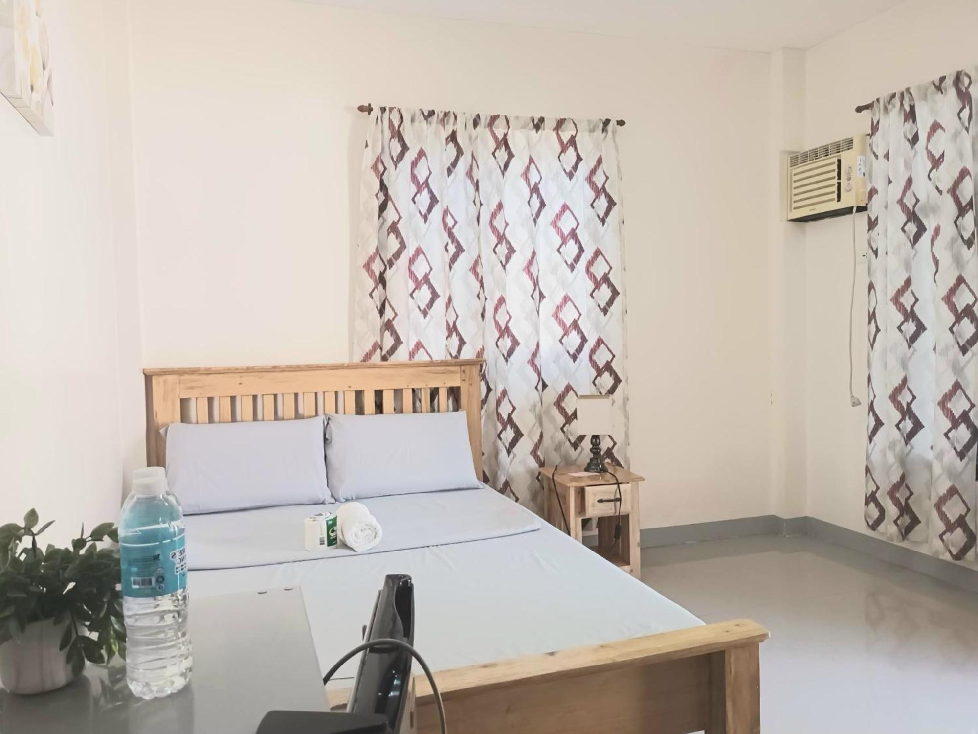 Grae'S Apartelle Moalboal Bagian luar foto