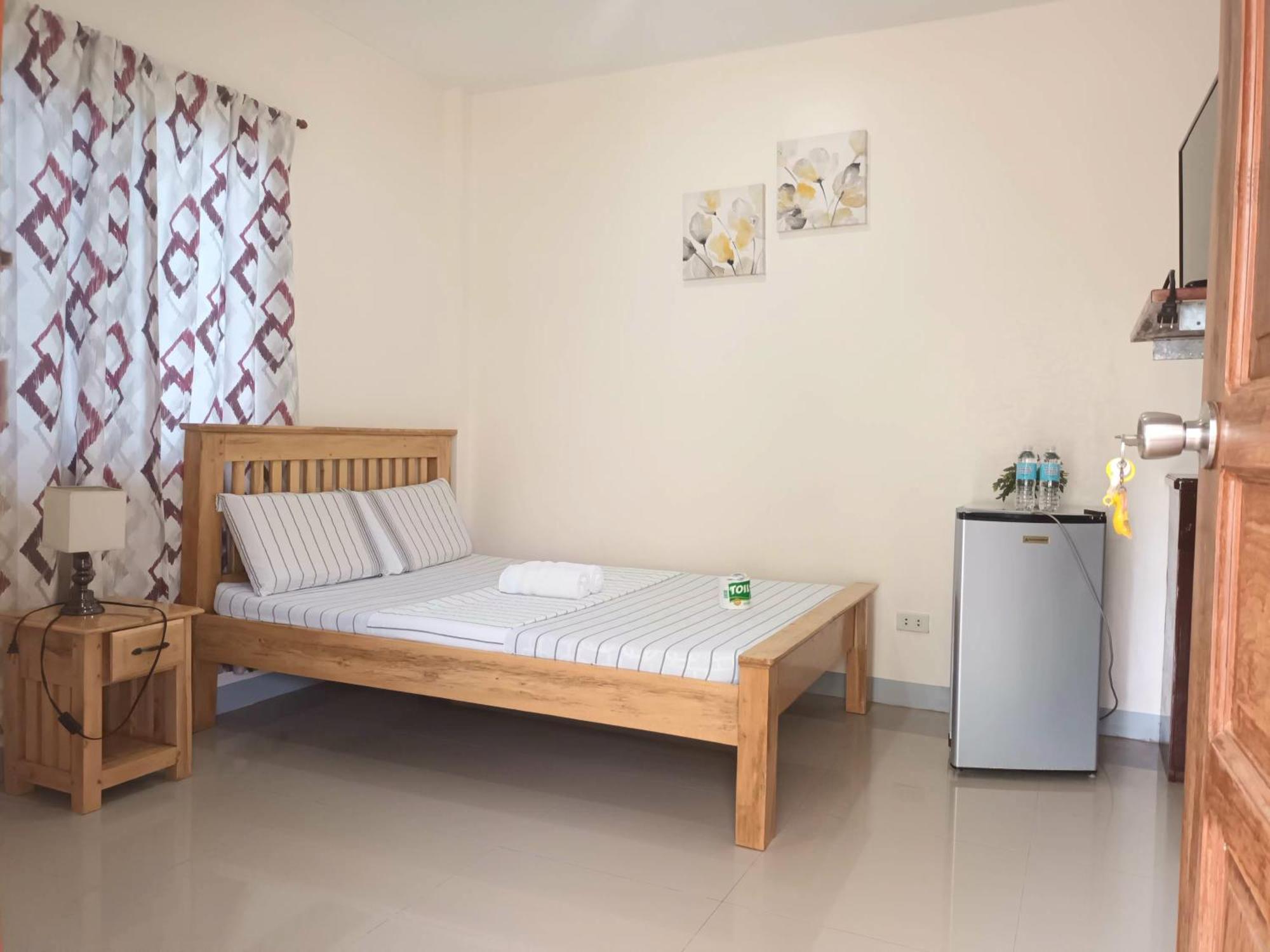 Grae'S Apartelle Moalboal Bagian luar foto