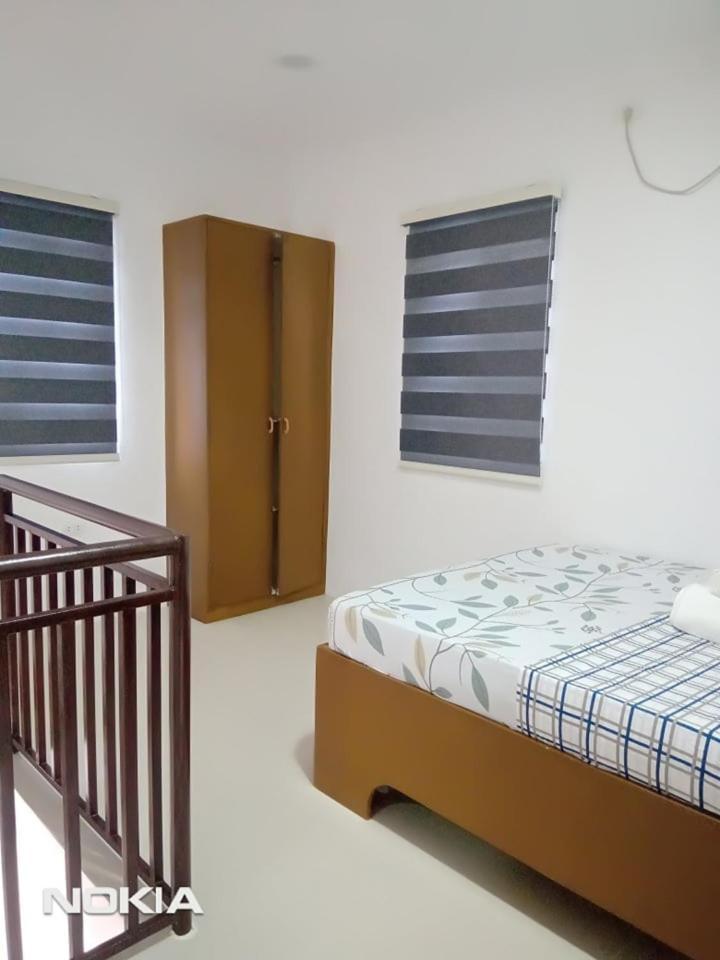 Grae'S Apartelle Moalboal Bagian luar foto