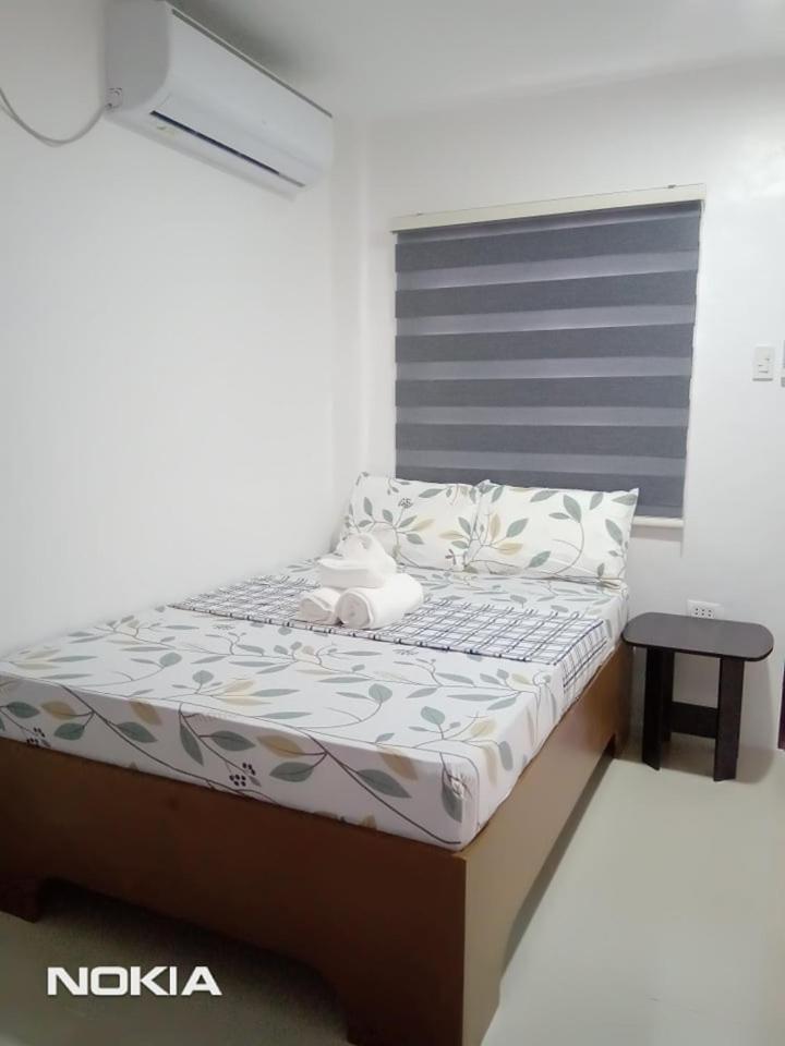 Grae'S Apartelle Moalboal Bagian luar foto