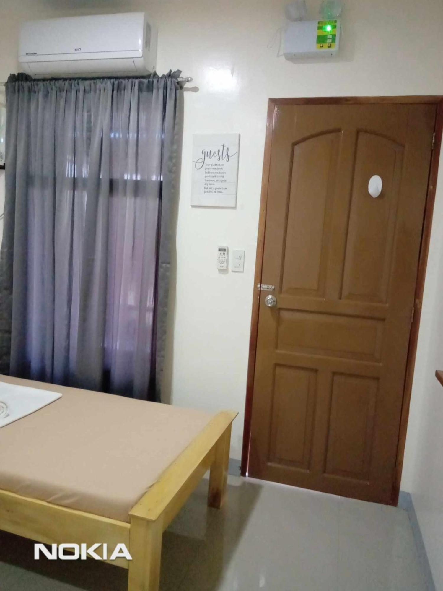 Grae'S Apartelle Moalboal Bagian luar foto