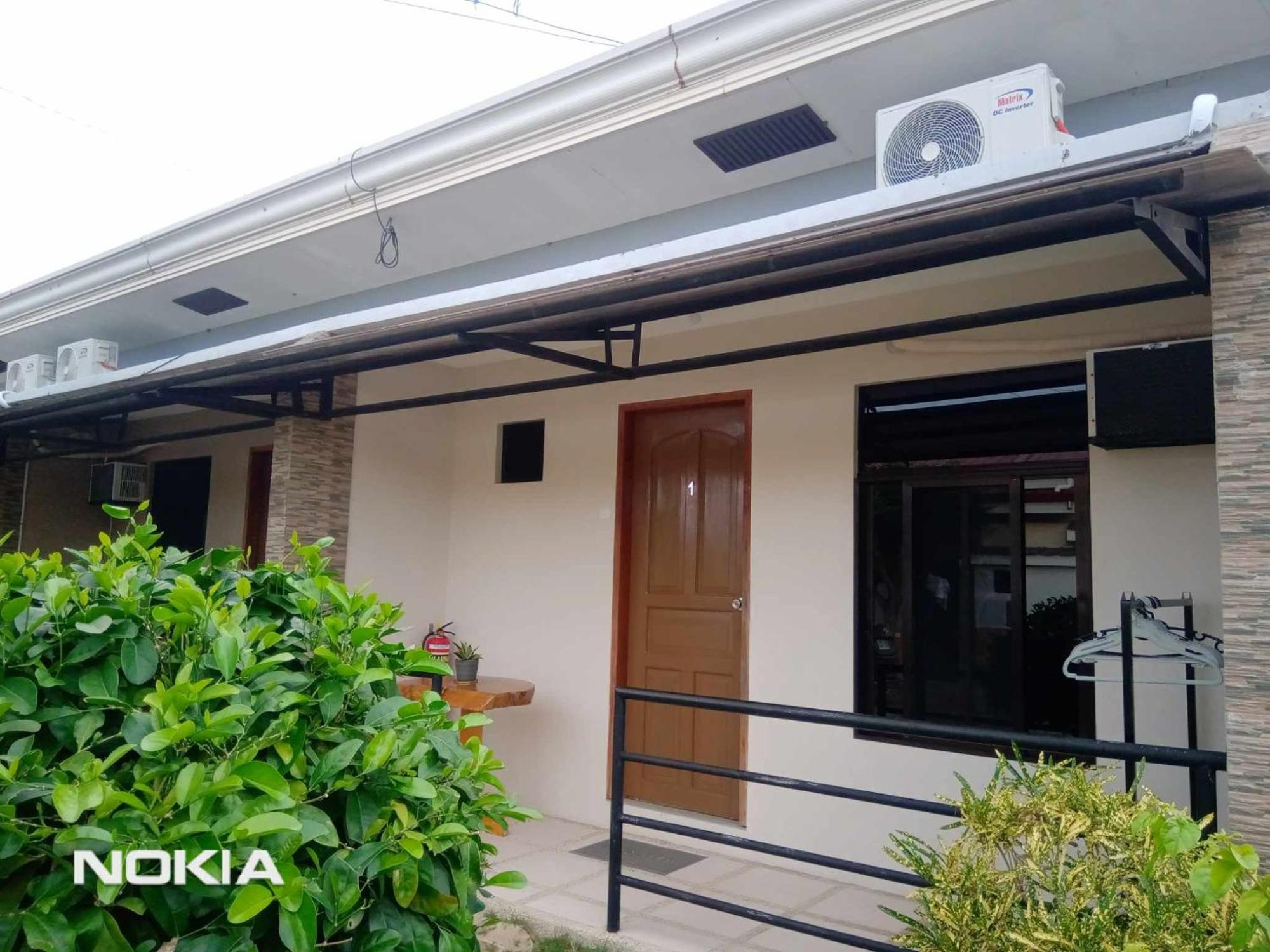 Grae'S Apartelle Moalboal Bagian luar foto