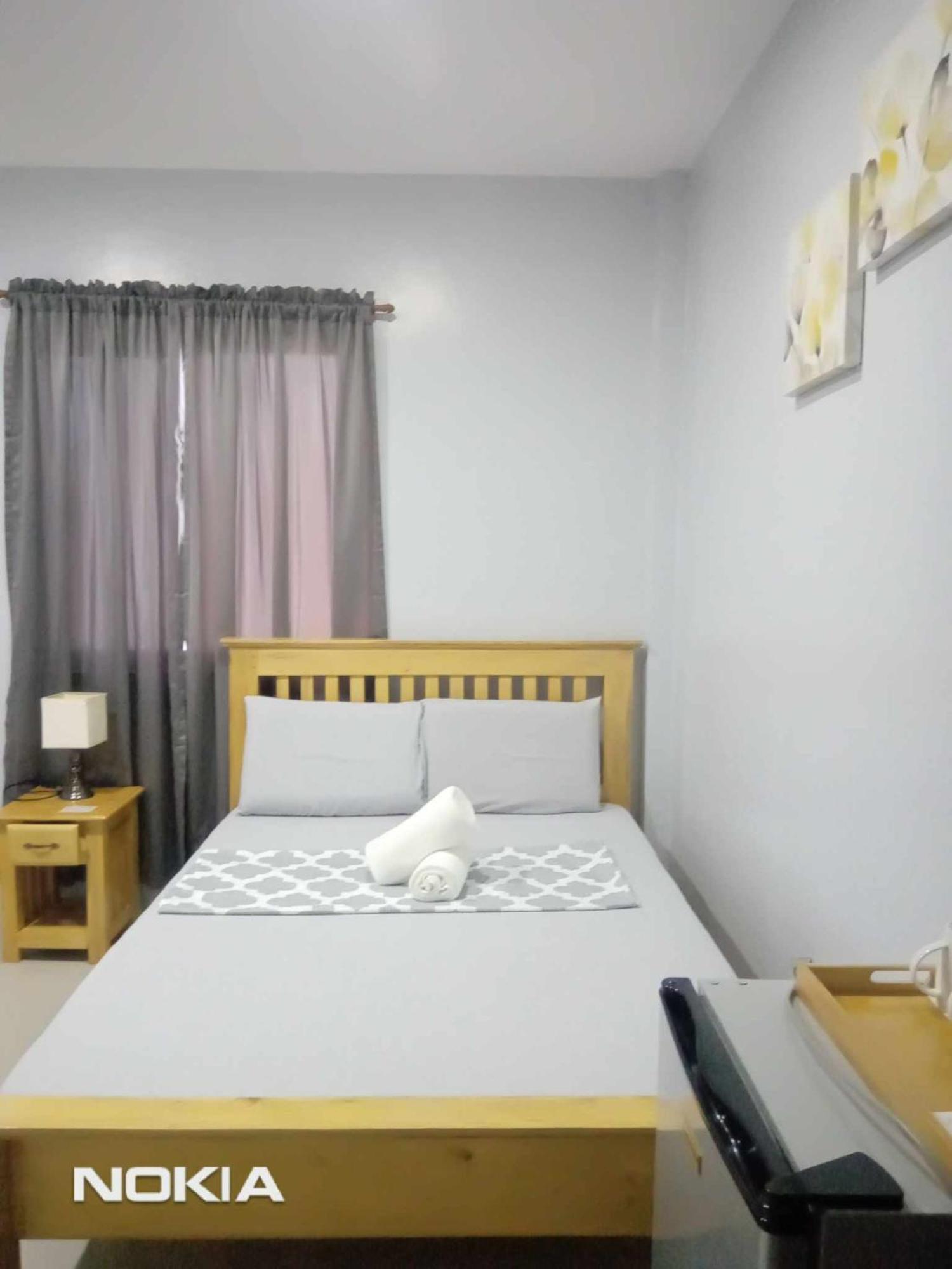 Grae'S Apartelle Moalboal Bagian luar foto