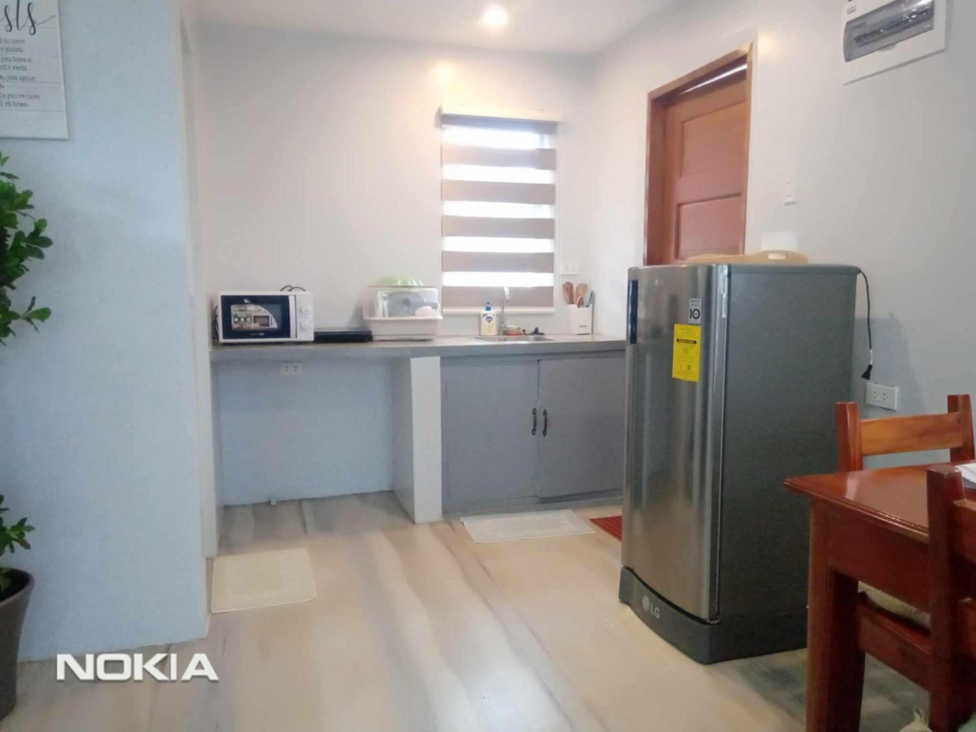 Grae'S Apartelle Moalboal Bagian luar foto