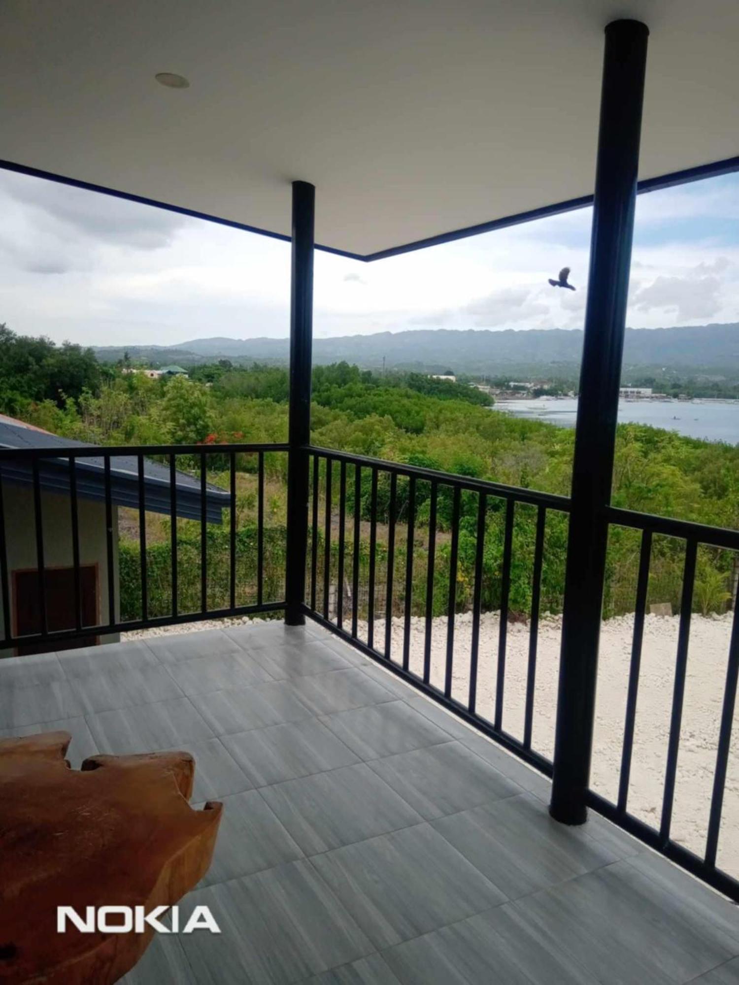Grae'S Apartelle Moalboal Bagian luar foto