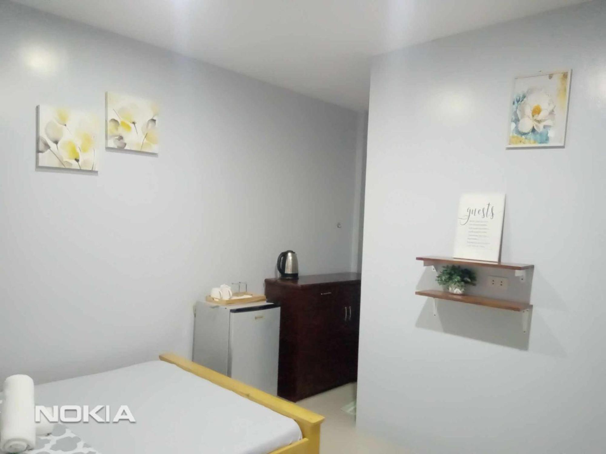 Grae'S Apartelle Moalboal Bagian luar foto