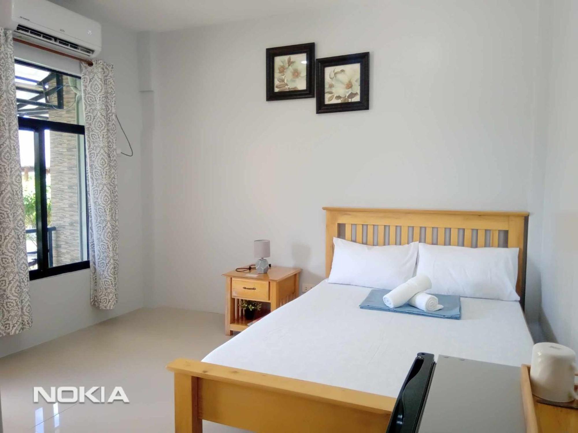 Grae'S Apartelle Moalboal Bagian luar foto