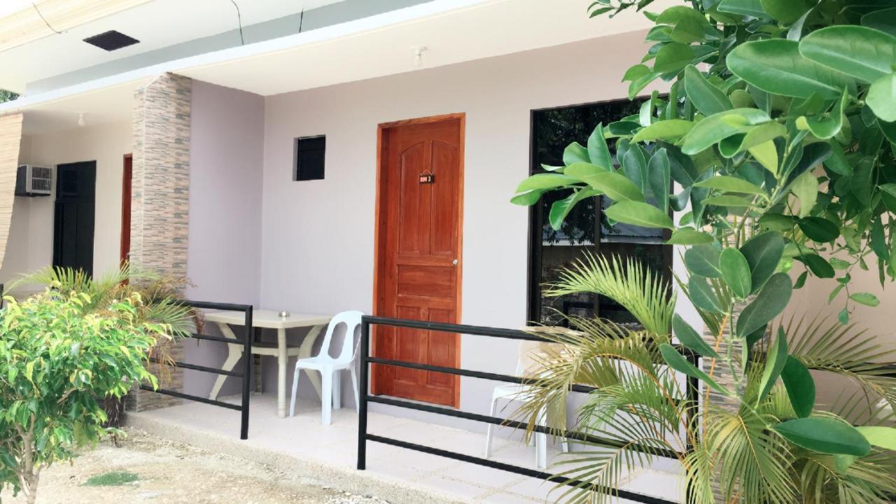 Grae'S Apartelle Moalboal Bagian luar foto